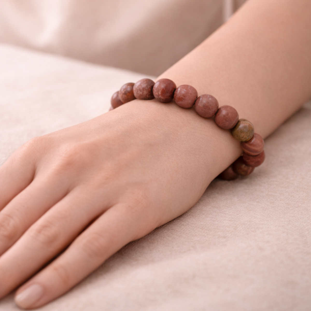 Rhodochrosite Bracelet wearing the hand